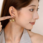 Boucles d'oreilles pour femme au design incurvé moderne