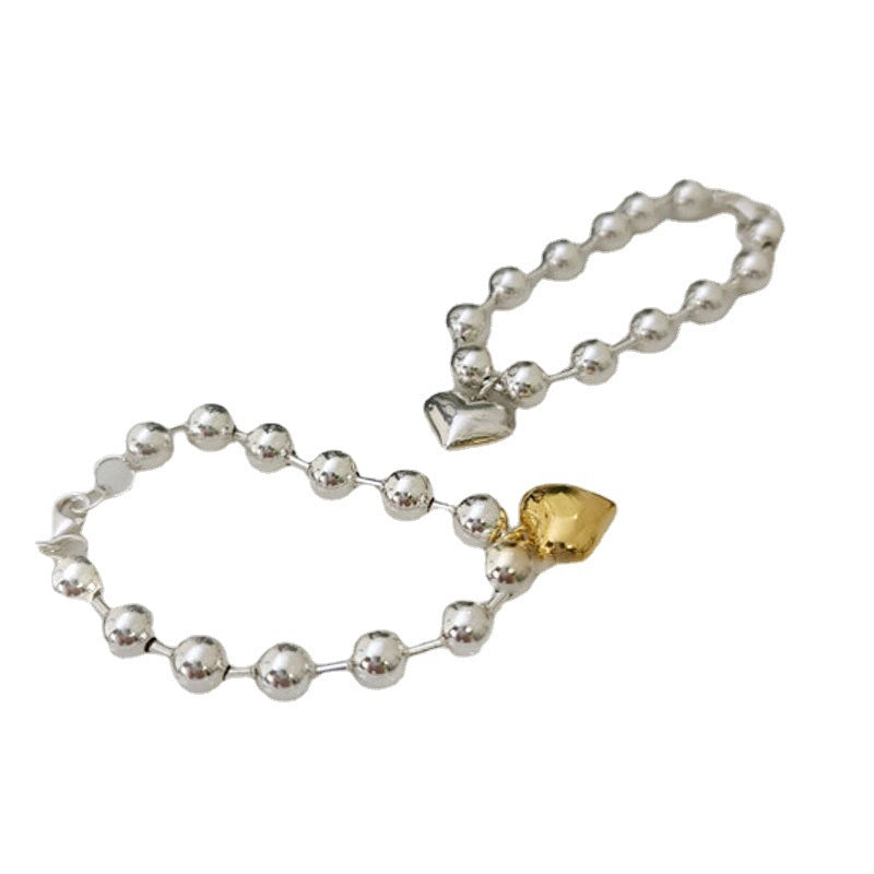 Bracelet cœur et perles pour femme