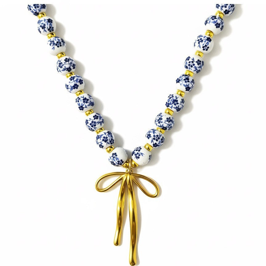 Collier décoratif pour femme avec pendentif nœud