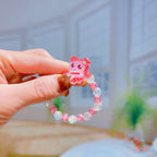 Bracelet fantaisie avec breloques dessin animé