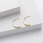 Boucles d'oreilles pendantes pour femme au design incurvé élégant