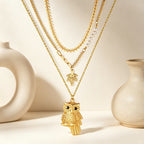 Collier multi-rangs pour femme avec pendentif hibou et détails dorés