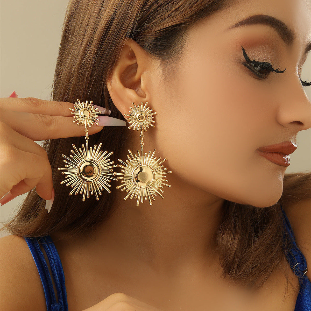 Boucles d'oreilles pendantes pour femme motif feuille