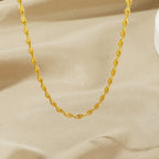 Collier chaîne torsadée dorée pour femme