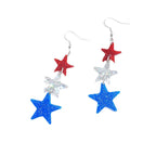 Boucles d'oreilles longues lettres en acrylique avec effet hologramme et paillettes
