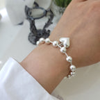 Bracelet cœur et perles pour femme