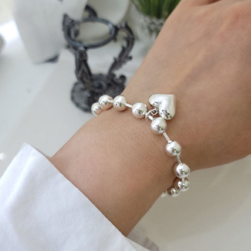 Bracelet cœur et perles pour femme