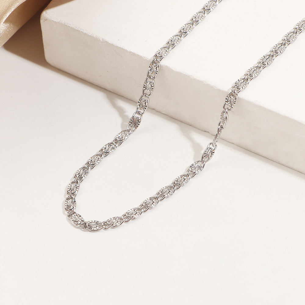Ensemble collier et bracelet dorés texturés
