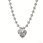 Collier pour femme avec pendentif cœur unique et perles brillantes