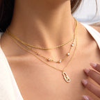 Collier pour femme avec pendentif trombone élégant et zircones