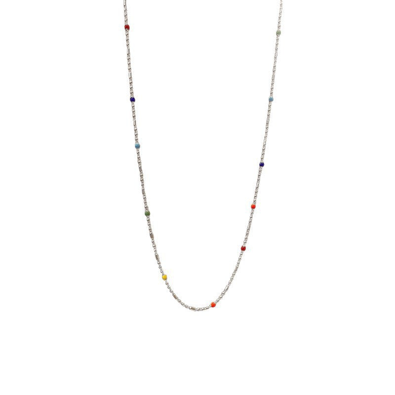 Bracelet à chaîne et perles multicolores délicat
