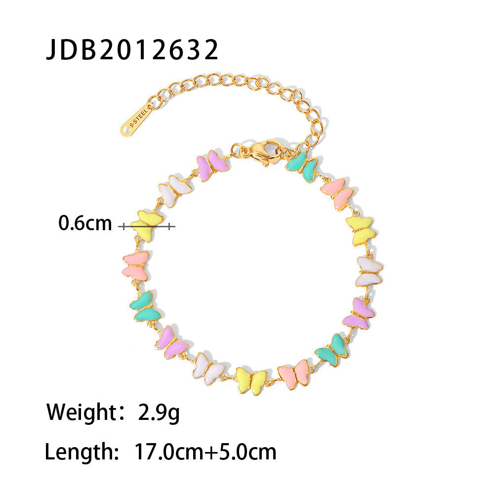 Bracelet femme avec pendentifs papillons colorés