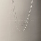Collier superposé à chaîne argentée élégante