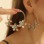 Boucles d'oreilles pour femme motif floral luxueux avec perles