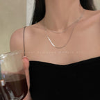 Collier superposé à chaîne argentée élégante