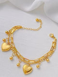 Bracelet pour femme avec breloques cœurs enchaînés