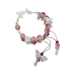 Bracelet à breloques papillon et fleurs fait main