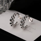Boucles d'oreilles pour femme en argent au design spiralé moderne