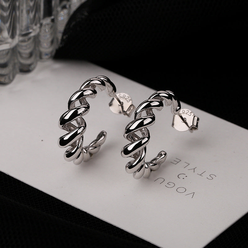 Boucles d'oreilles pour femme en argent au design spiralé moderne