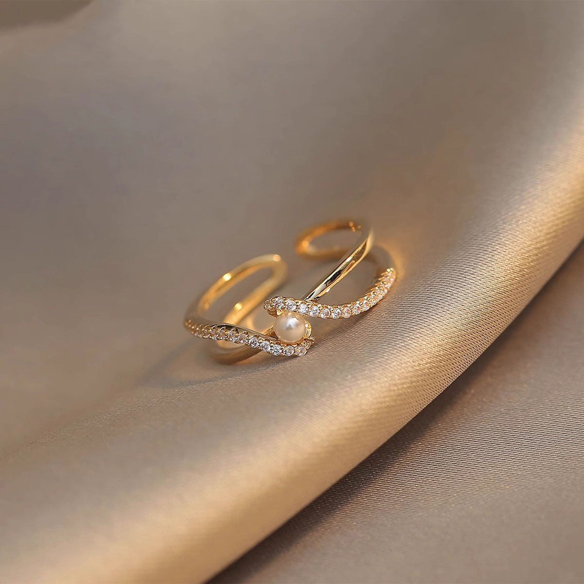 Bague spirale élégante avec perle et zircone