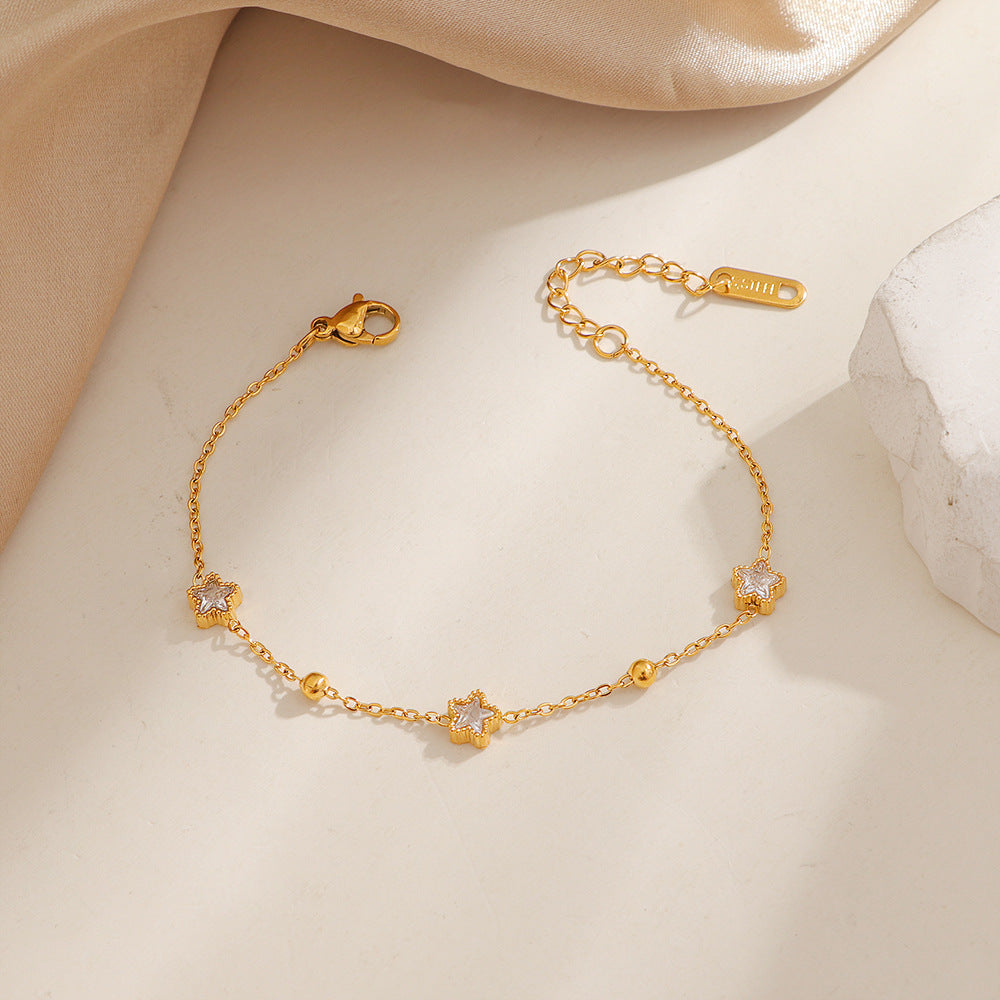 Bracelet de cheville doré pour femme avec étoiles et cristaux
