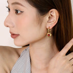 Boucles d'oreilles pendantes avec cristaux scintillants