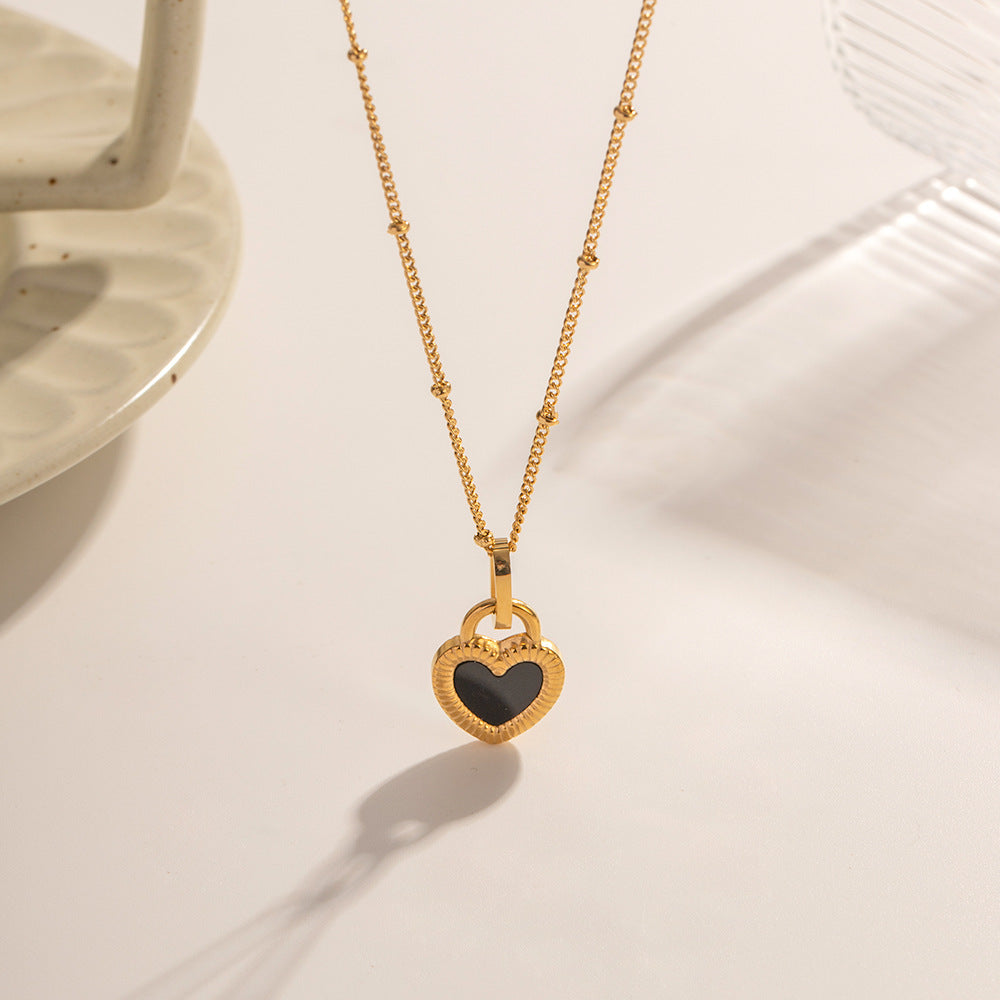Collier pour femme avec pendentif cœur et détails en zircone