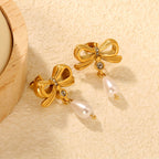 Boucles d'oreilles pendantes pour femme avec design floral et perles