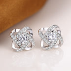 Boucles d'oreilles nœud en cristal étincelant avec insert en zircone