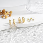 Boucles d'oreilles pendantes pour femme au design papillon élégant