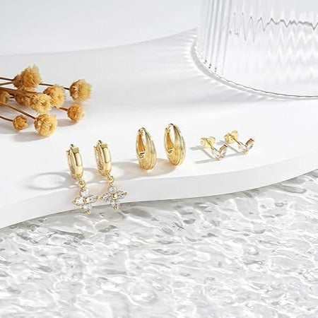 Boucles d'oreilles pendantes pour femme au design papillon élégant