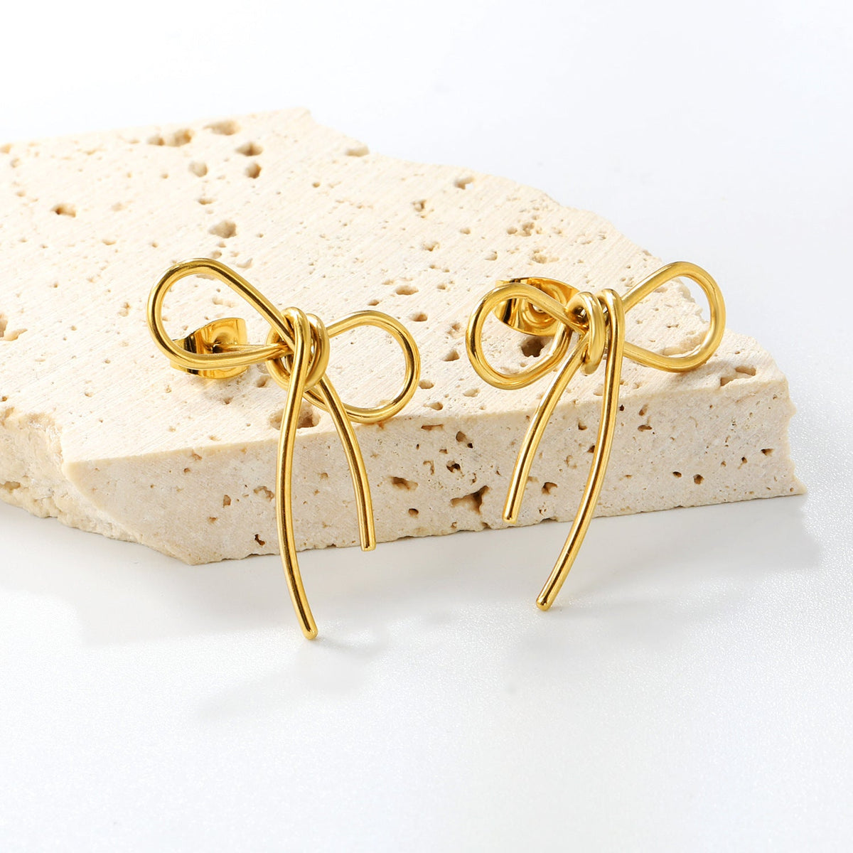 Boucles d'oreilles pour femme avec motif nœud