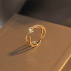 Bague spirale élégante avec perle et zircone