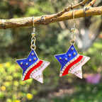Boucles d'oreilles pendantes étoile avec émail et cristaux