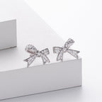 Boucles d'oreilles nœud en argent sterling 925 avec zircone
