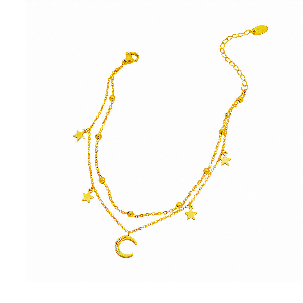 Chaîne de cheville pour femme avec pendentifs scintillants motif lune