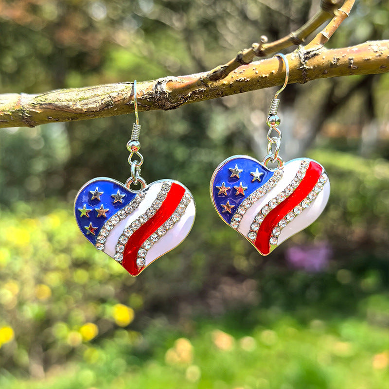 Boucles d'oreilles pendantes étoile avec émail et cristaux