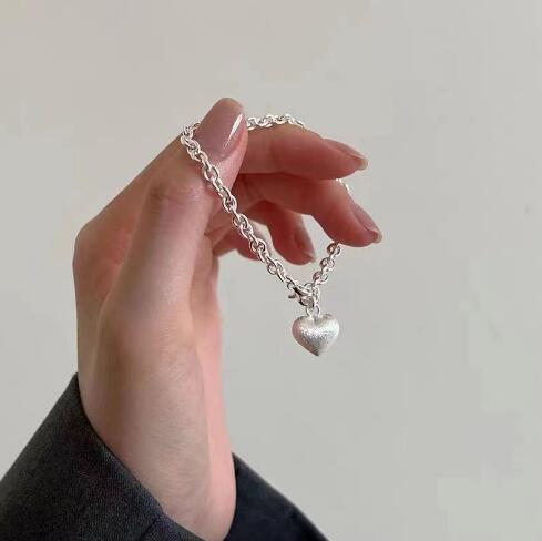 Bracelet pour femme avec pendentif cœur en acier inoxydable