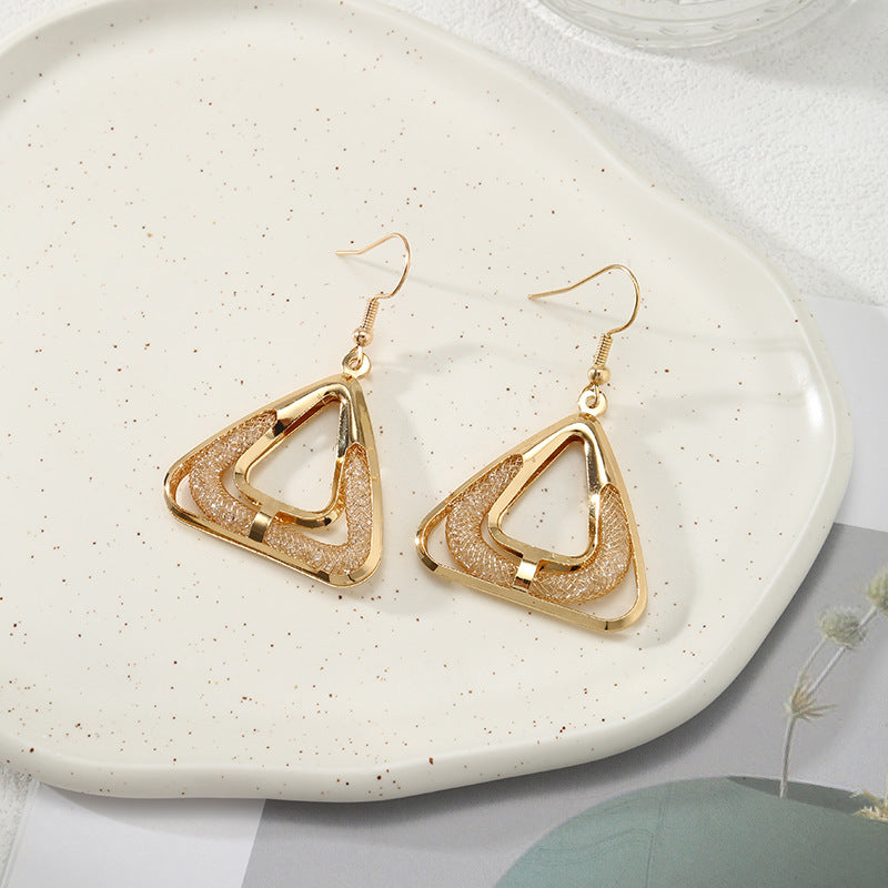 Boucles d'oreilles pour femme au design moderne et délicat