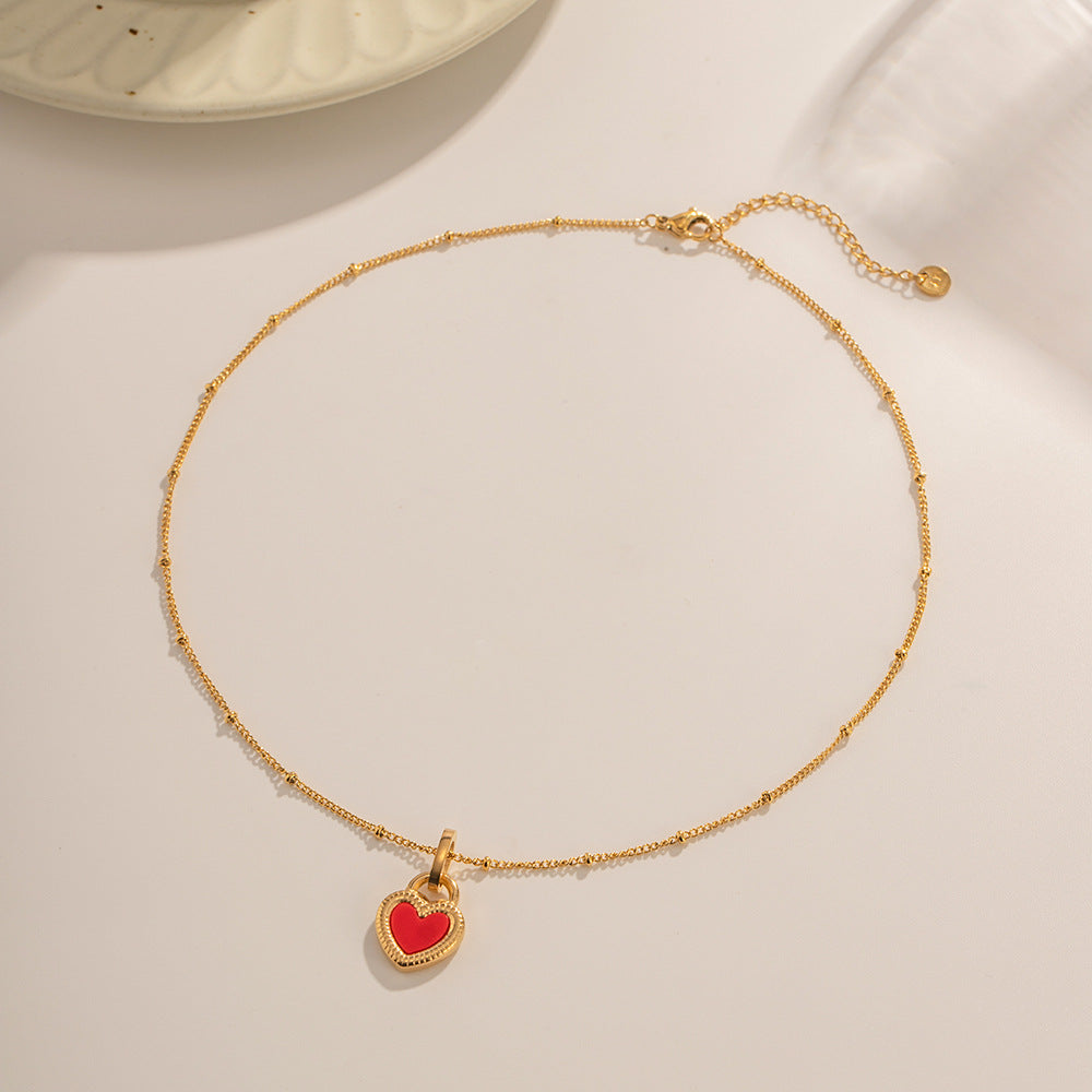 Collier pour femme avec pendentif cœur et détails en zircone