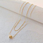 Collier superposé à pendentif cœur