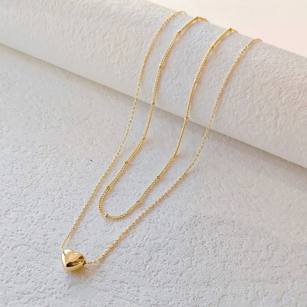 Collier superposé à pendentif cœur
