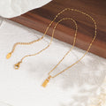 Collier élégant pour femme avec pendentifs minimalistes