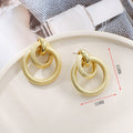 Boucles d'oreilles pendantes pour femme à double anneau
