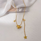 Collier pour femme avec pendentifs étoile et orbe