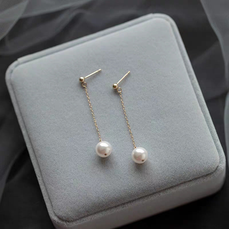 Boucles d'oreilles pendantes délicates avec perles pour femme