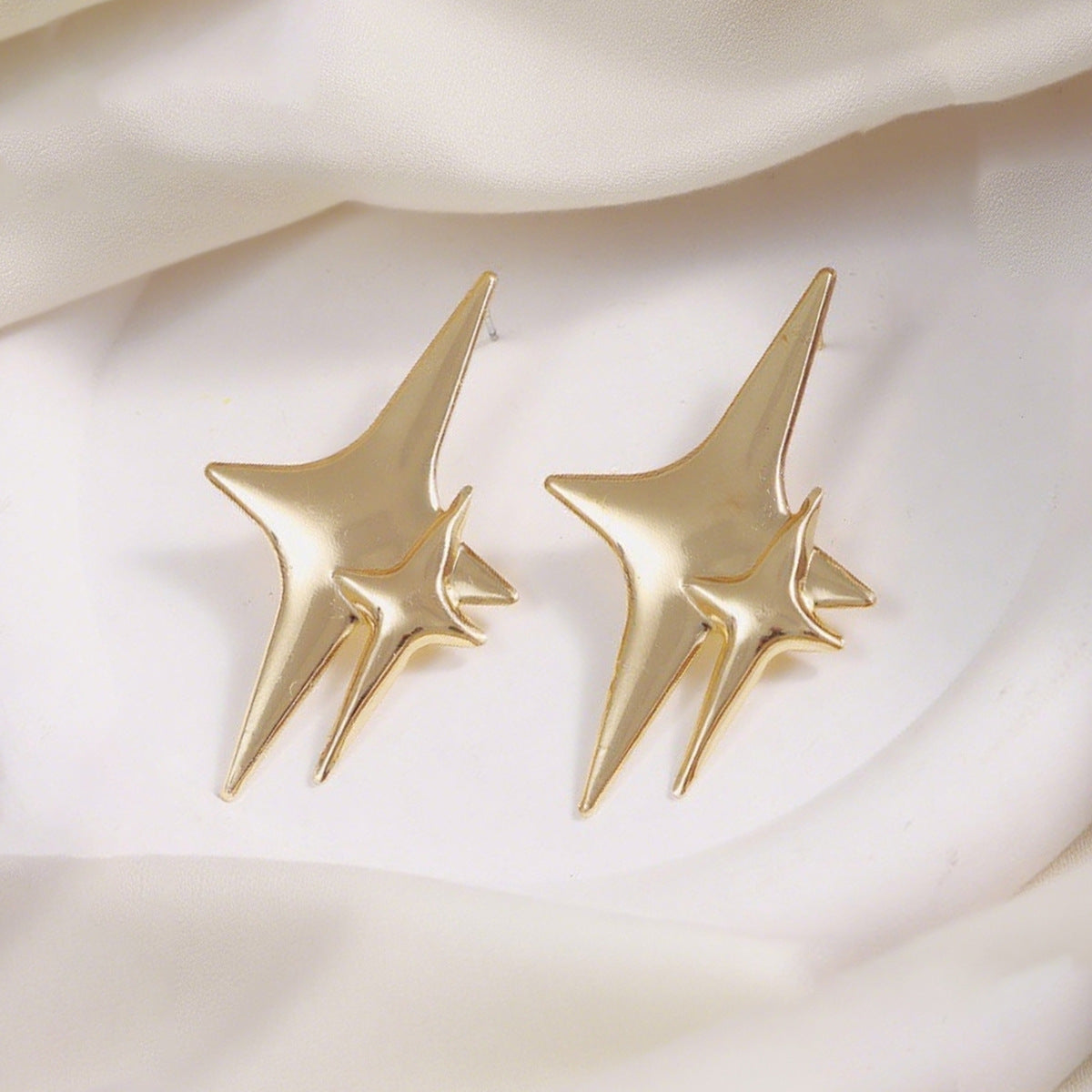 Boucles d'oreilles pour femme au design étoile moderne