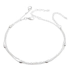 Bracelet de cheville délicat à chaînes superposées