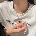 Collier avec pendentif en forme de cœur