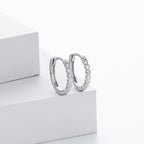 Boucles d'oreilles pendantes avec zircons modernes